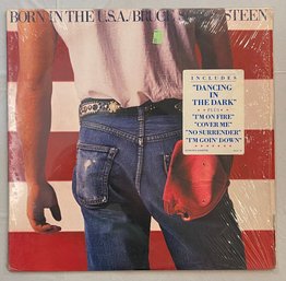 Bruce Springsteen - Born In The U.S.A. QC38653 VG Plus W/ Original Insert, Shrink Wrap And Hype Sticker