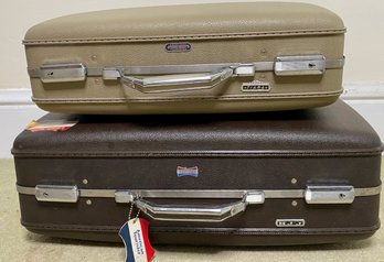 Two American Tourister Suitcases