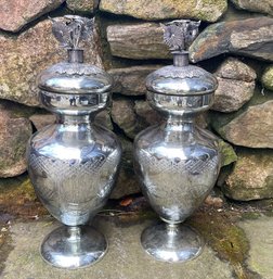 Pair Of  Mercury Glass Apothecary Urns With Metal Flower Decoration