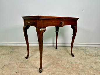 A Vintage Game Table With Pull Out Extenders