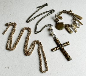 A Crucifix On A Chain, And Charm Necklace