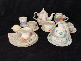 Ceramic Tea Pot Plus Assortment Of Cups And Plates