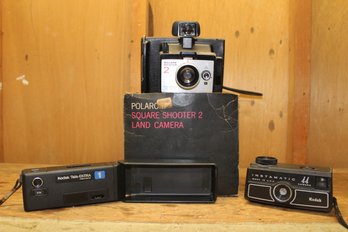 Vintage Polaroid Square Shooter Land Camera & A Pair Of Kodak 35mm Camera's