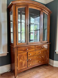 A Cherry Finish Americana China Cabinet -*** NOTE PICK UP INFO