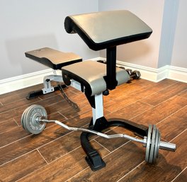 Weight Bench With Barbell And Plates