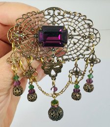 GORGEOUS SADIE GREEN VICTORIAN REVIVAL GOLD TONE PURPLE AND GREEN DANGLE/SWAG BROOCH