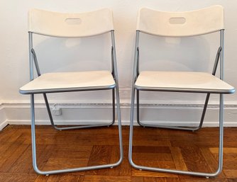 2 Ikea NICK Plastic Folding Chairs