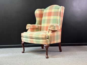 A Classic Upholstered Wing Chair By Sherrill In Plaid