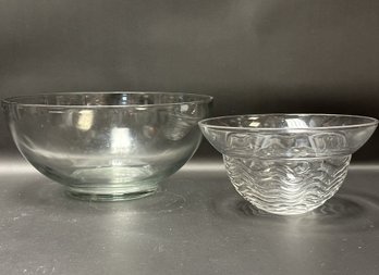 A Pair Of Compatible Clear Glass Bowls