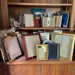 A Huge Assortment Of Picture Frames