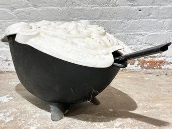 An Antique Enameled Cast Iron Coal Scuttle