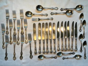 Ornate Antique Sterling Flatware (35 Pcs)