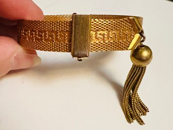 VINTAGE PRETTY GOLD TONE ADJUSTABLE TASSEL BRACELET