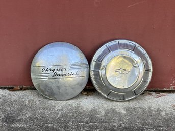 A Pair Of Vintage Hubcaps, Chrysler & Chevy
