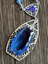 Vintage Rhodium Filigree Pendant Necklace With A Large Faceted Blue Glass 'sapphire' And Enamel Accent