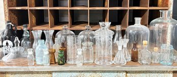 A Collection Of Antique Glass Bottles And More