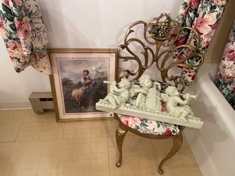 A PLASTER RELIEF, A DECORATIVE PRINT, AND A CAST IRON DRESSING STOOL