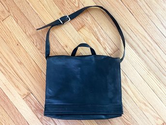 A Leather Messenger Bag By Kenneth Cole