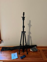 A Metal Adjustable Tripod Stand