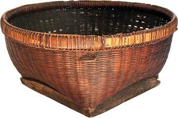 An Antique Woven Rattan Chinese Rice Basket