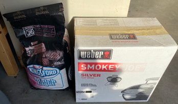 Weber Charcoal Grill And Bag Of Charcoal