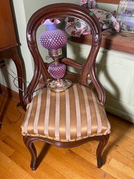 A BALLOON BACK CHAIR AND A CRANBERRY HOBNAIL LAMP