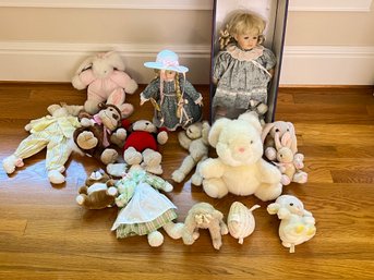 Pair Of Dolls And Stuffed Animals