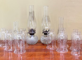 A Pair Of Antique Oil Lamps And Many Hurricanes For Smaller Type Lamps