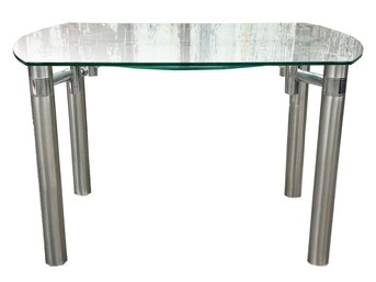 A Chrome And Glass Extendable Table - Becomes A Circular Top