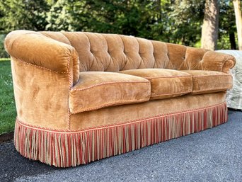 A Custom Tufted Caramel Velvet And Fringe Sofa By George Smith LTD