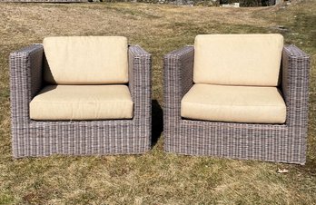 A Pair Of Modern Resin Outdoor Arm Chairs By Kingsley-Bate