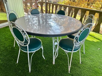 Wrought Iron Patio Table And Six Upholstered Seat Chairs