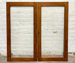 A Pair Of Antique Oak And Glass Paneled Doors