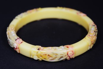 Signed 'CRICK' Bakelite Carved Bangle Bracelet Having Floral Design