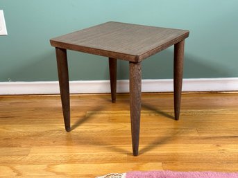 A Classic Little Vintage Side Table With A Laminated Top & Tapered Legs