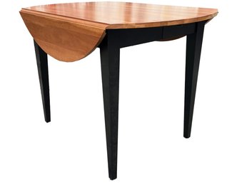 An American Maple Extendable Dining Table By Ethan Allen