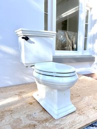 A Two Piece Kohler Memoir Toilet
