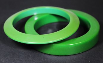 Two Green Plastic Bangle Bracelets, One Being Bakelite The Other 'plastic'