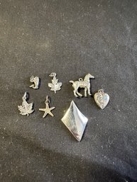 Group Of Sterling Silver Pendants And Charms