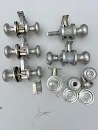 A Collection Of Satin Nickel Baldwin Door Hardware
