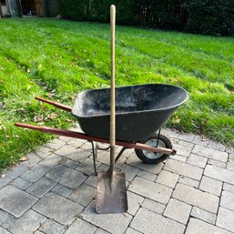 A Duo Of Gardening Tools - Wheelbarrow And Shovel