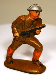 Antique Rubber Toy Soldier With Gun Charging Pose