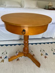 Tan Round Pedestal Table With Single Drawer 24x29.5