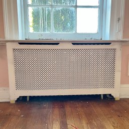 A Collection Of Wood Trimmed Metal Radiator Grates