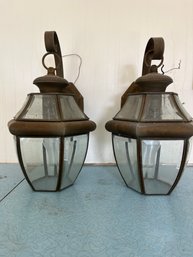 A Pair Of Metal Carriage Lamps