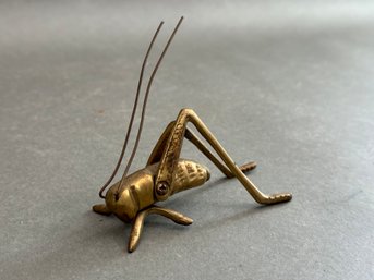 A Whimsical Vintage Grass Hopper In Brass