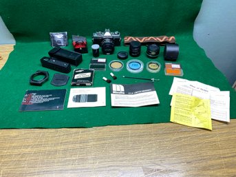 Vintage Minolta XG 7 35mm Camera With Lenses, Accessories, Strap, Original Paperwork In Vintage Camera Bag.