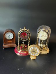 A Collection Of 4 Clocks