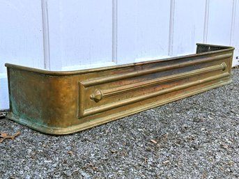 An Antique Brass Fireplace Fender