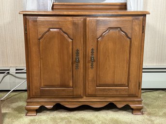 A Vintage Cabinet In Solid Wood With Raised Panel Doors & Bracket Feet